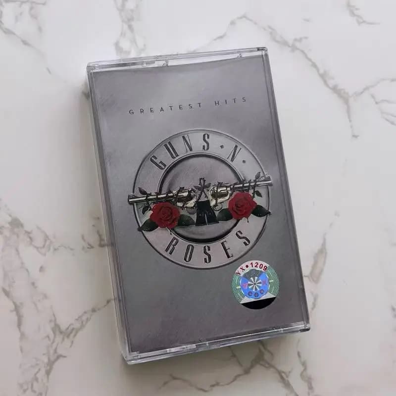 شريط موسيقى هارد روك Guns N' Roses Axl Rose، ألبوم Greatest Hits، Sweet Child O Mine، أشرطة كاسيت، أزياء تنكرية، مشغل سيارة، صندوق موسيقى تصويرية